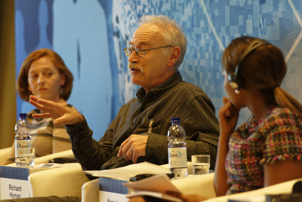 Picture of Richard Hyman speaking at a panel.