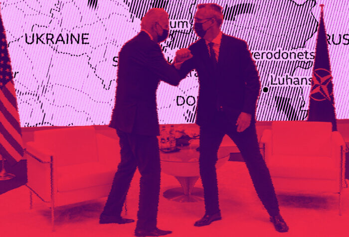 Joe Biden and Jens Stoltenberg arm bump at NATO summit over a map of the war in Ukraine