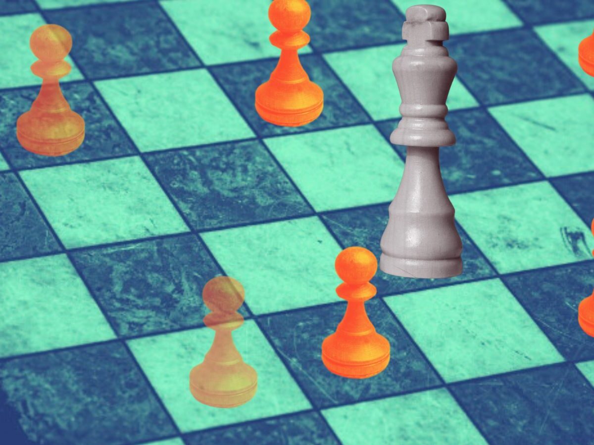 Stylized chess board with pieces in orange.