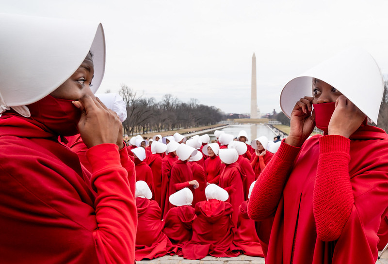 Images of uniformed handmaidens from the filming of The Handmaid’s tale at the Lincoln Memorial.