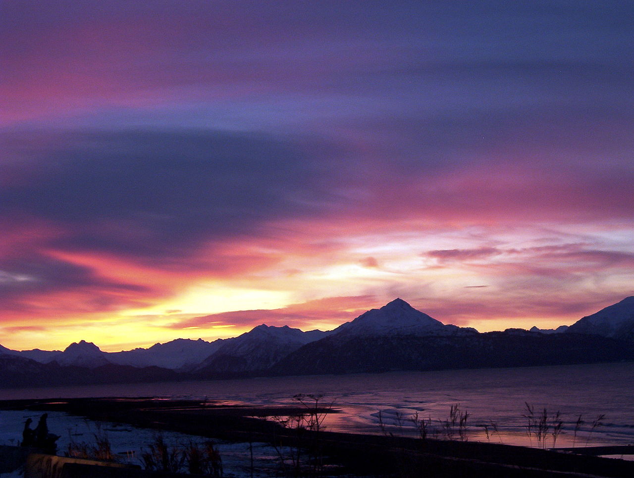 A sunrise over Kachemak Bay in Alaska, part of the Cook Inlet before it is destroyed by oil drilling.