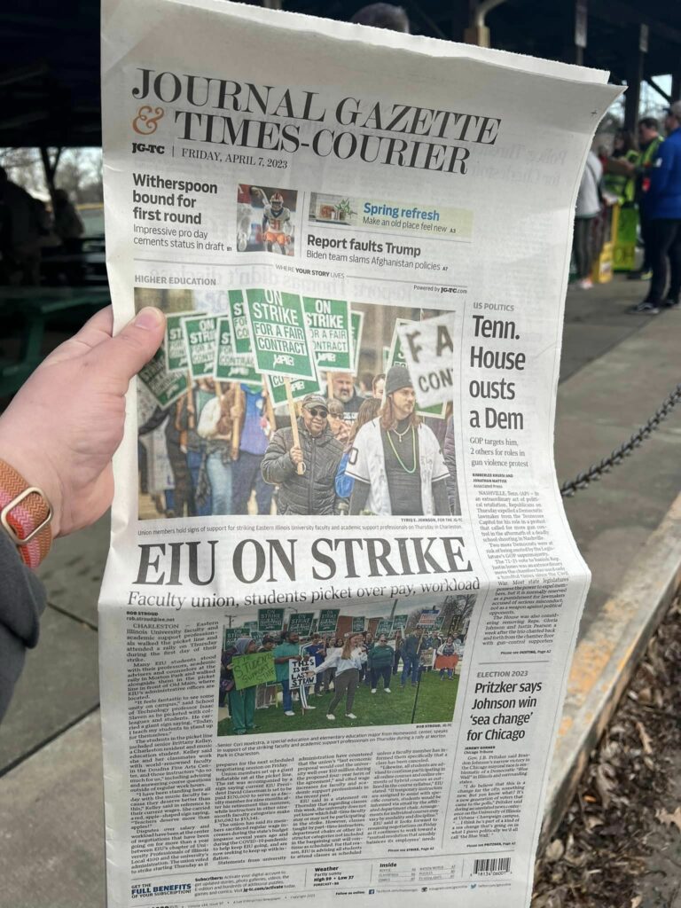 a newspaper headline reads EIU on strike
