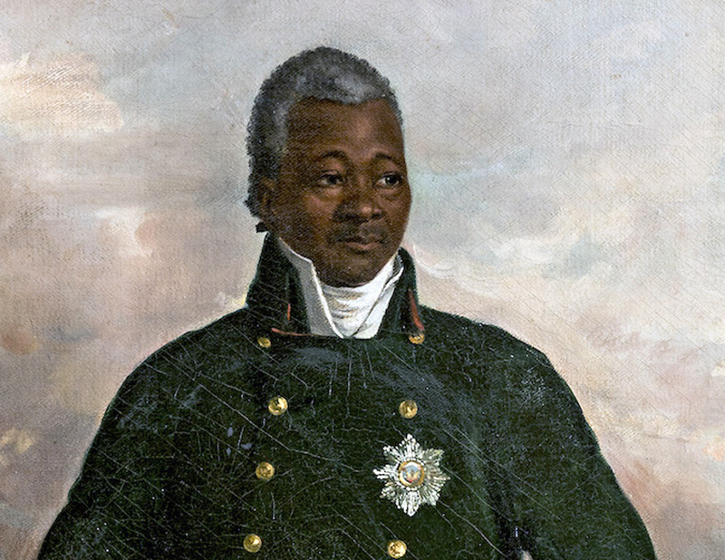 Painted portrait of a Black man with gray hair in a double-breasted black coat. A white shirt underneath shows as a high collar. He’s shown from the chest up. He’s wearing a silver medal and looking to the right.