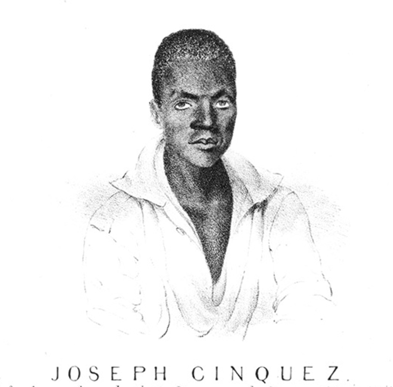 Black and white engraving of a Black man in his mid-twenties shown from the arms up. He’s wearing a flowing white shirt, open in a “V” in front, and he looks at the artist with a calm and serious expression.